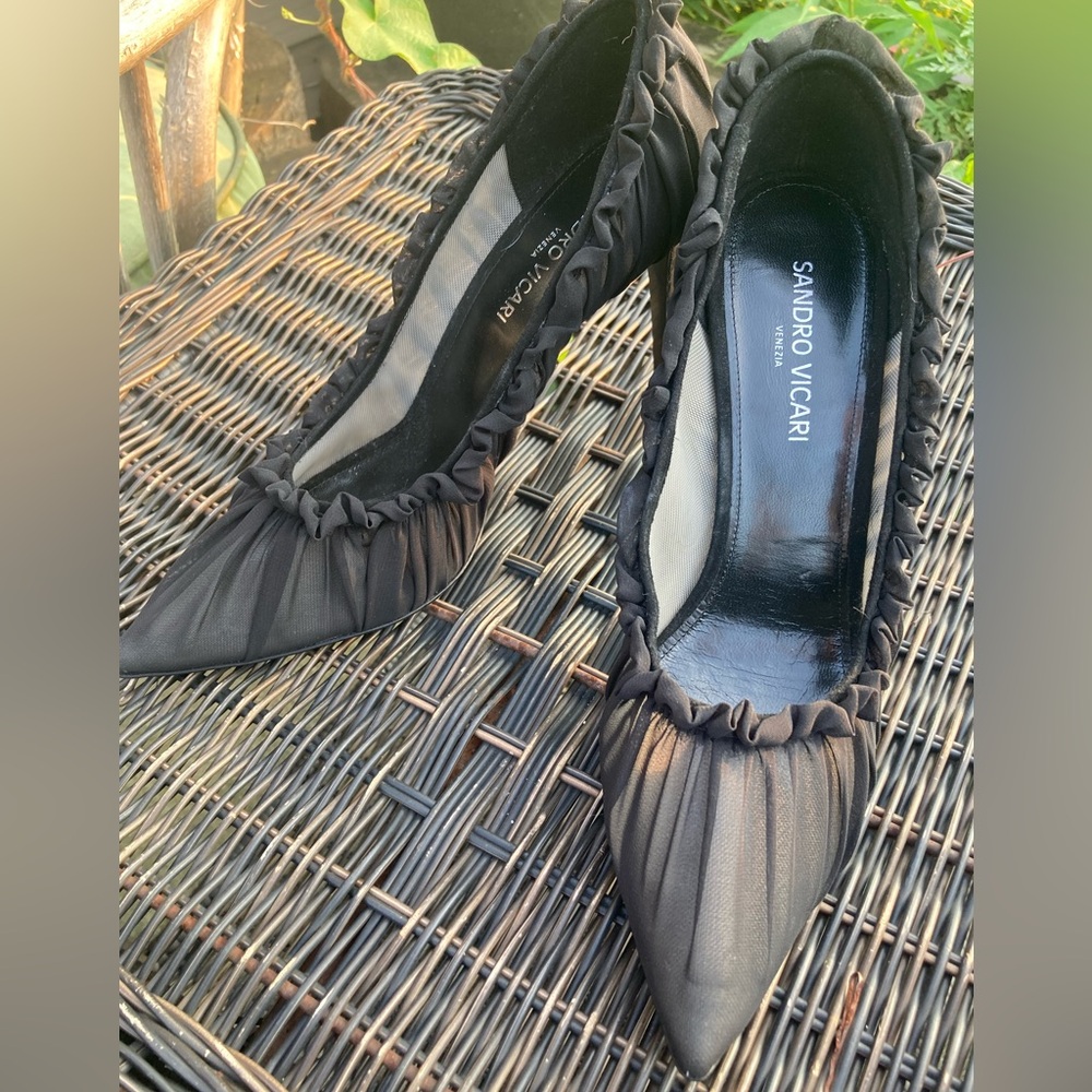 These are practically brand new! They were only worn once for a fashion show!